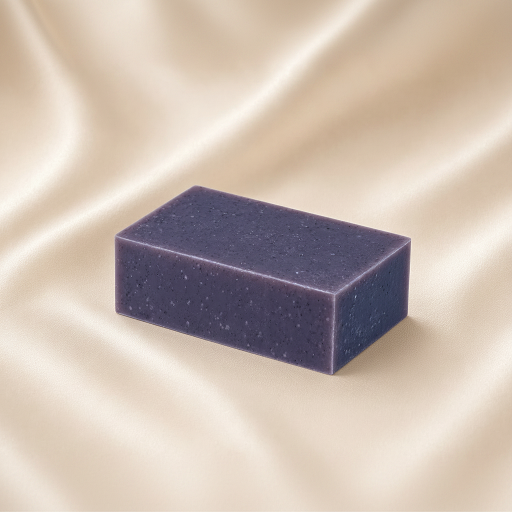 Mae Luna Lavender Harmony purple botanical soap bar on cream satin.